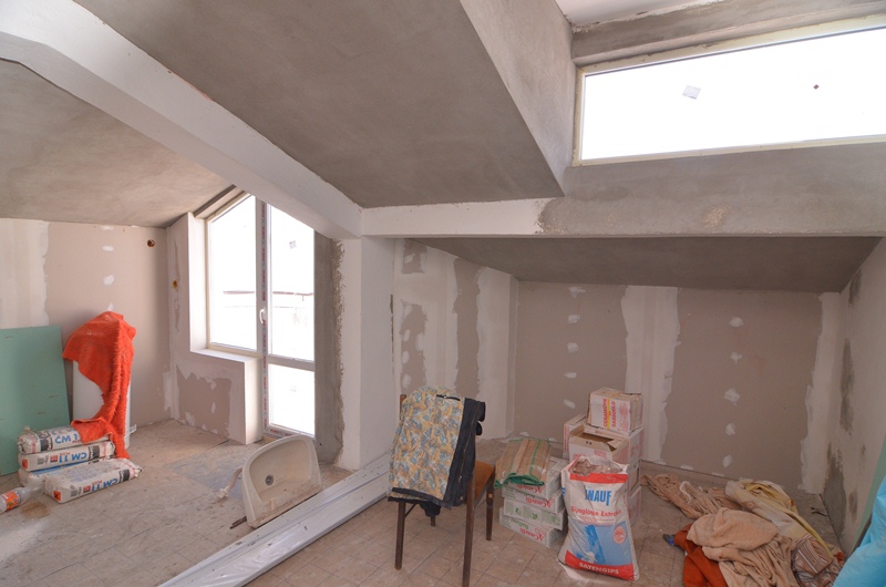 Smooth plastering of the walls